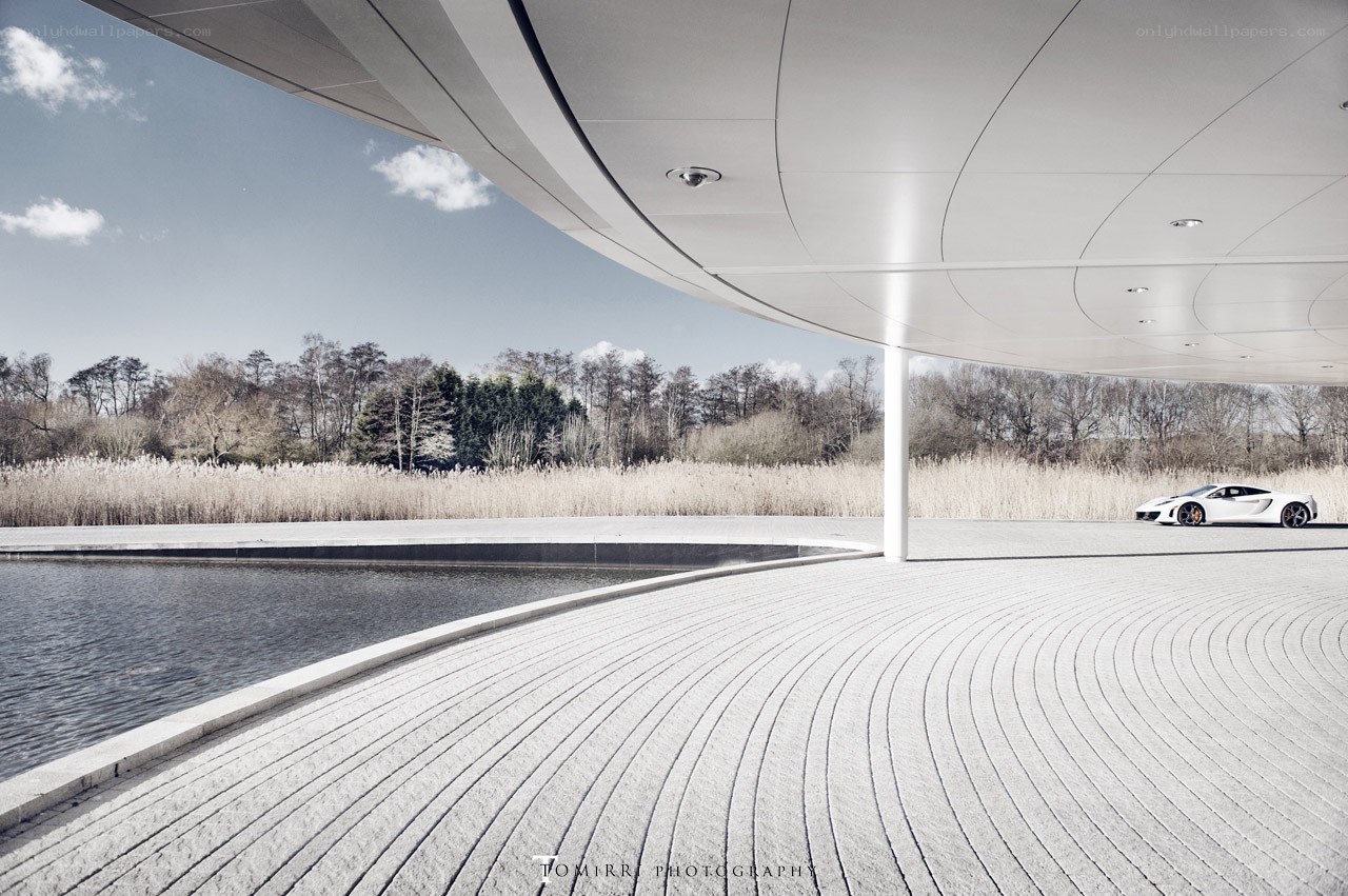 White car under modern canopy