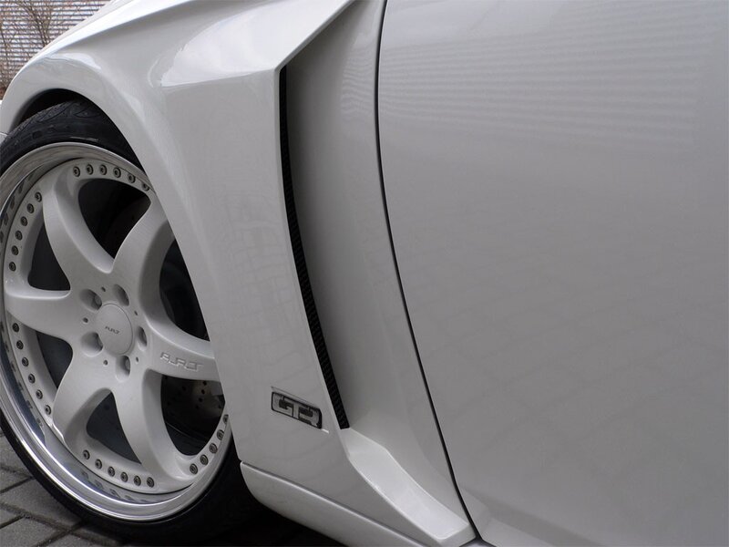 white car wheel and fender