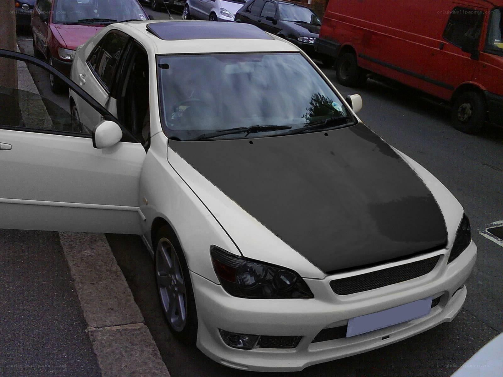 white car with black hood