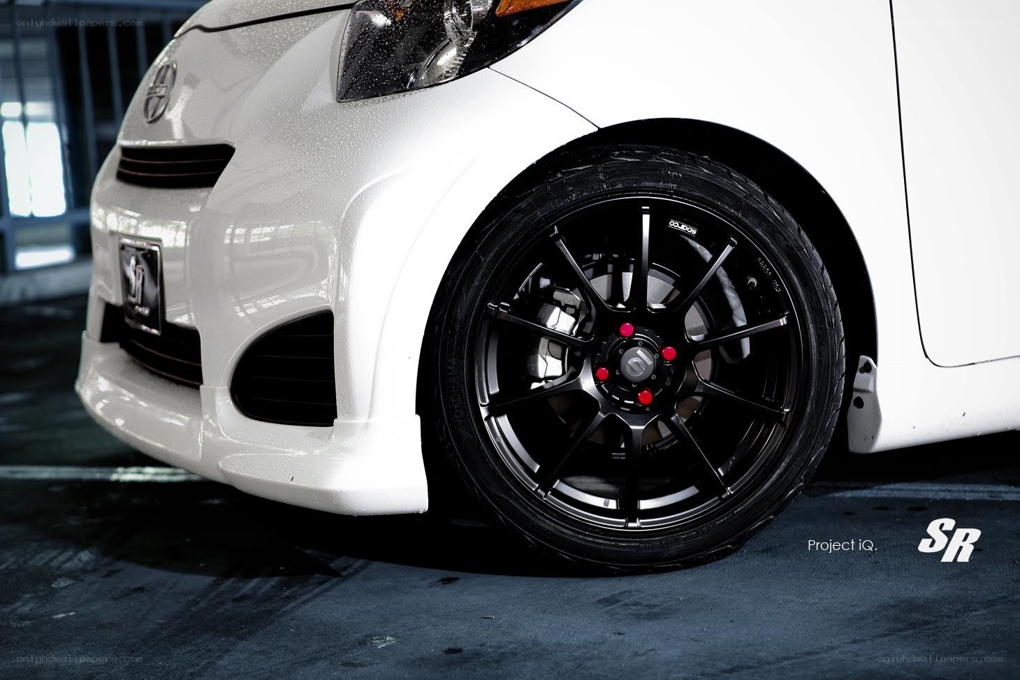white car with black wheels