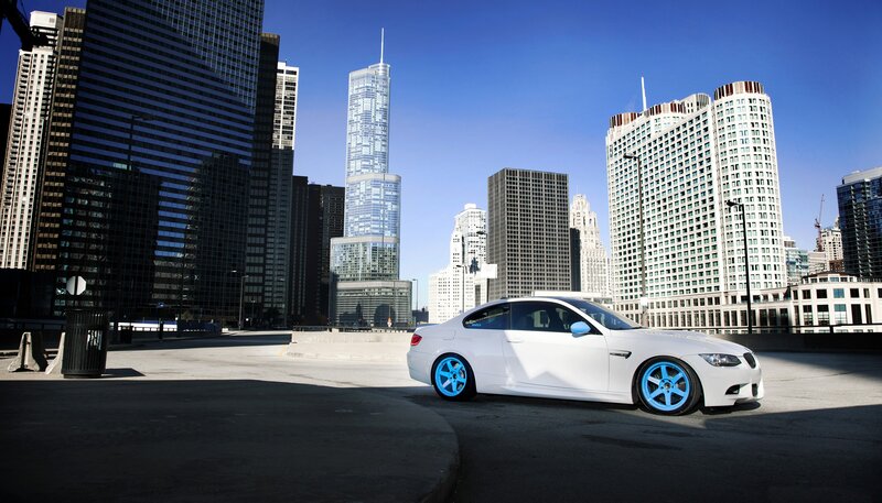 White Car with Blue Wheels — Dramatic, Afternoon, Photograph, City Skyline