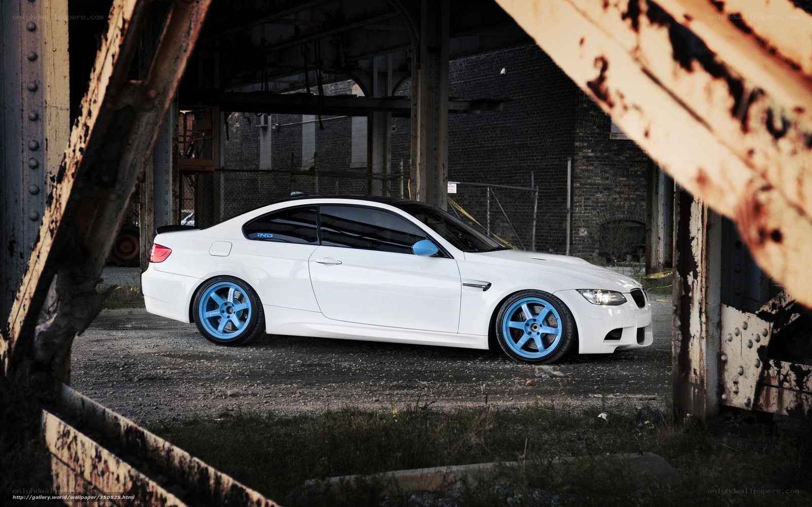 white car with blue wheels