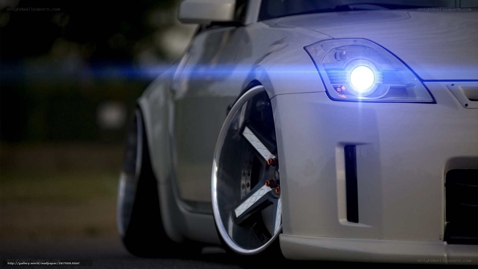 white car with bright headlights