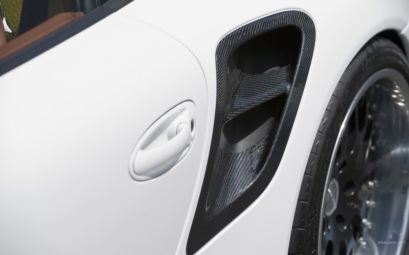 white car with carbon fiber details