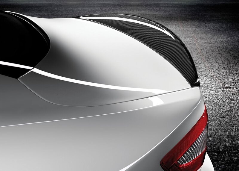 white car with carbon fiber spoiler