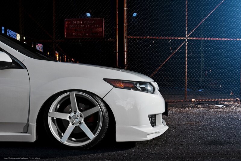 white car with custom wheels