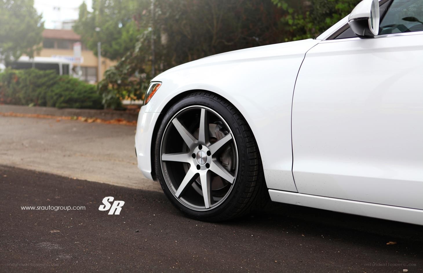 white car with custom wheels