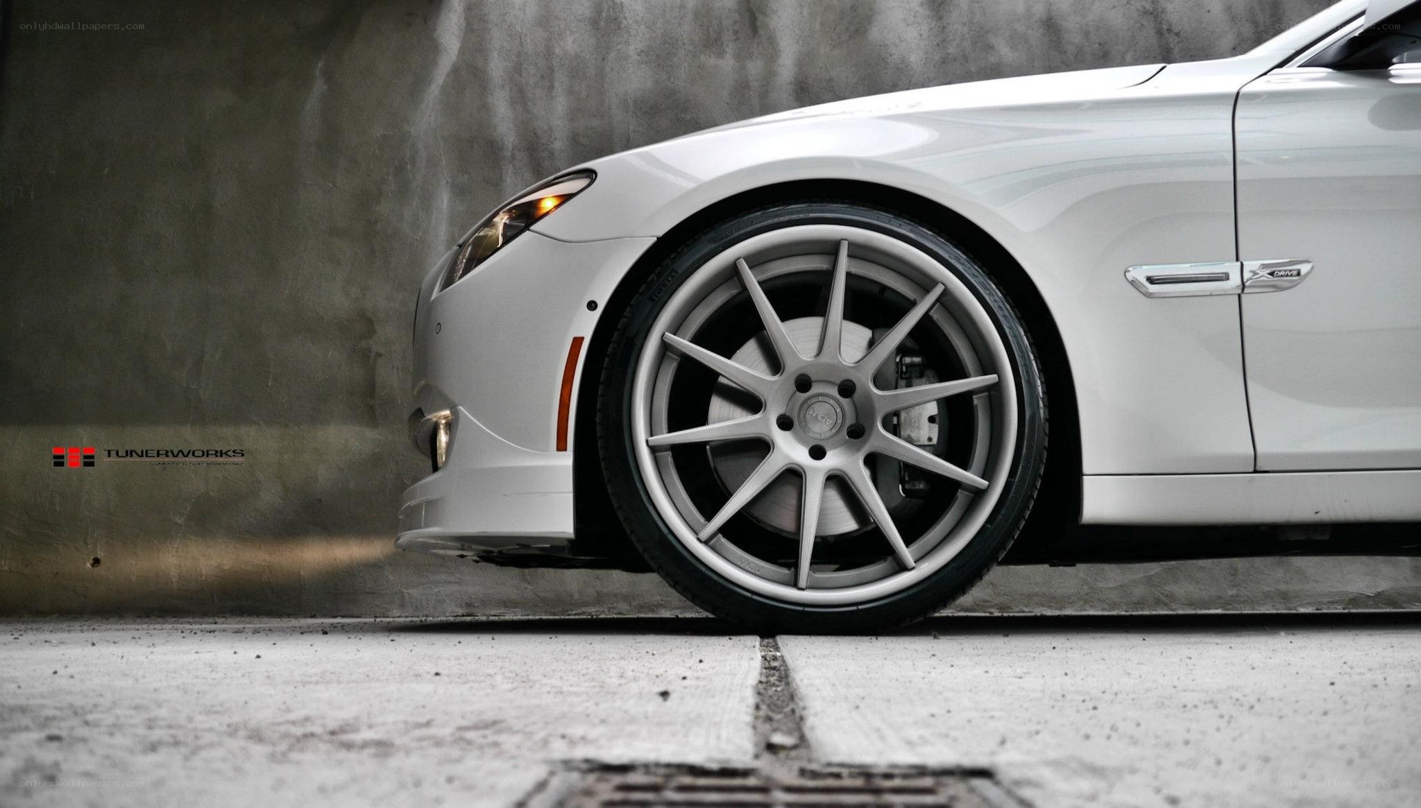 white car with custom wheels