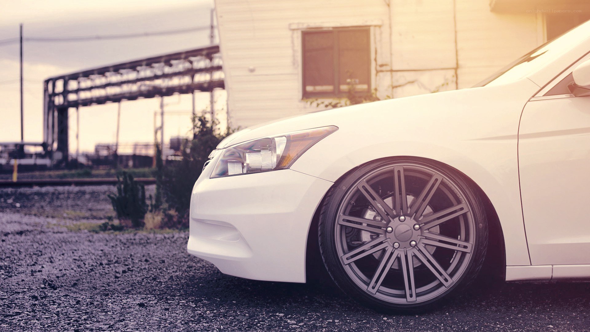 white car with custom wheels
