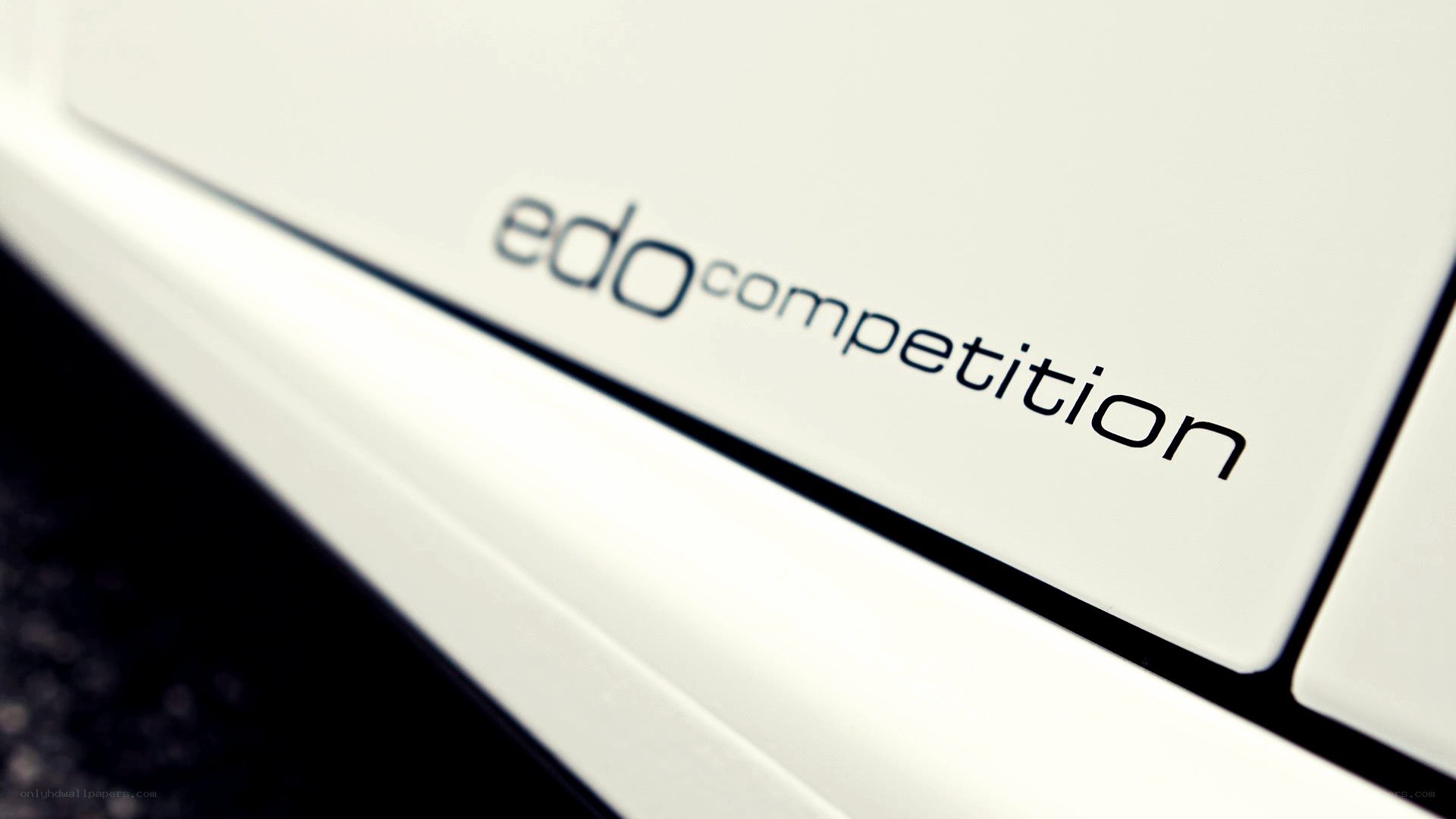 White car with edo competition badge