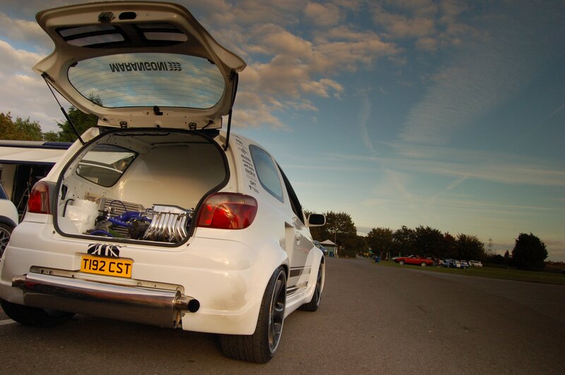 White car with engine in trunk