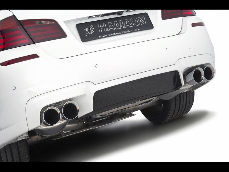 white car with exhaust