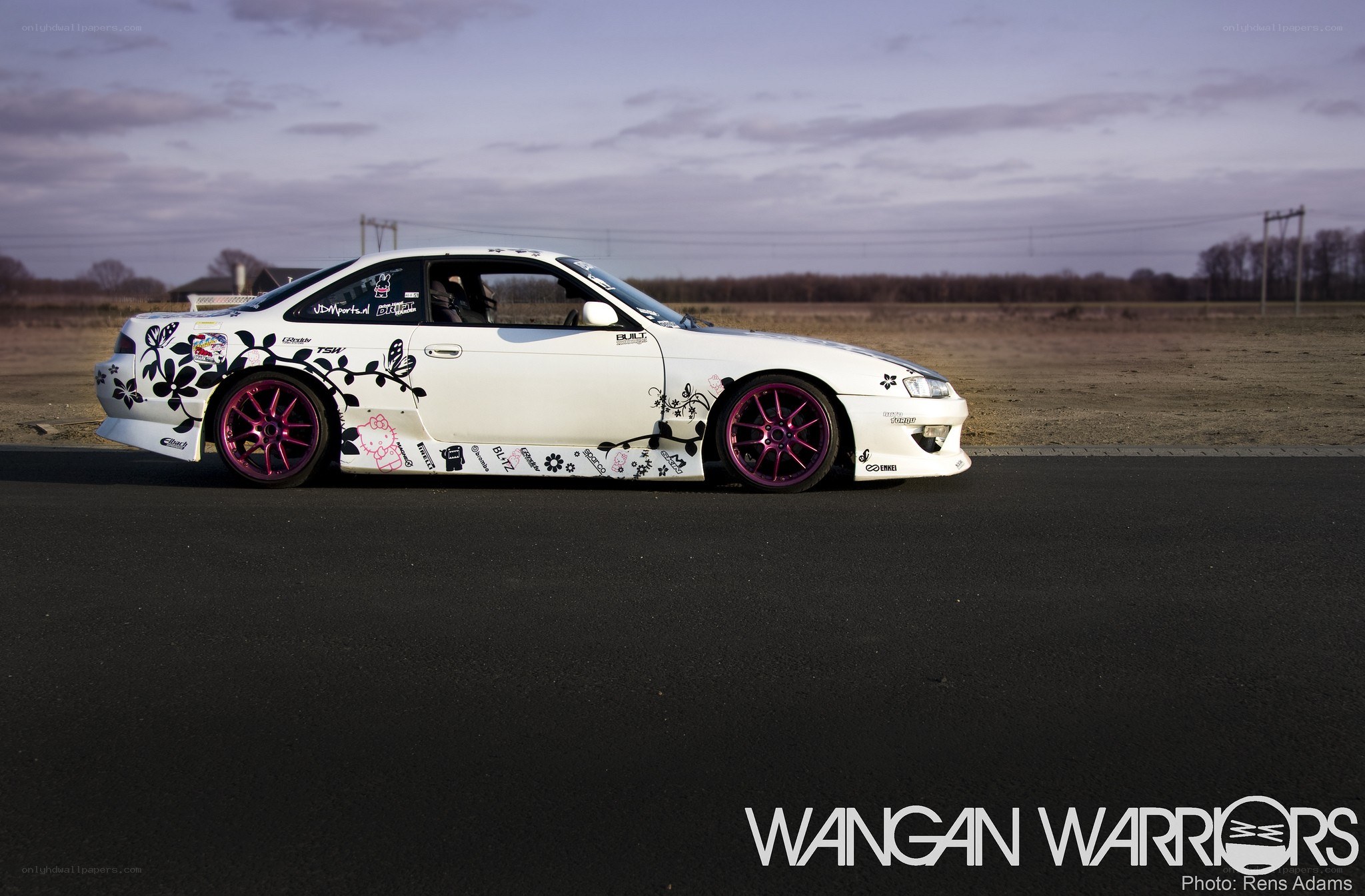 white car with floral decals