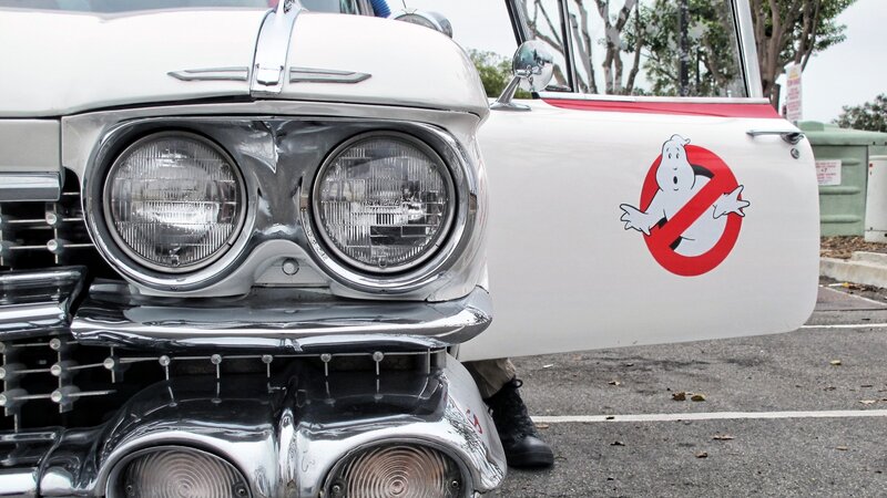 White Car with Ghost Logo