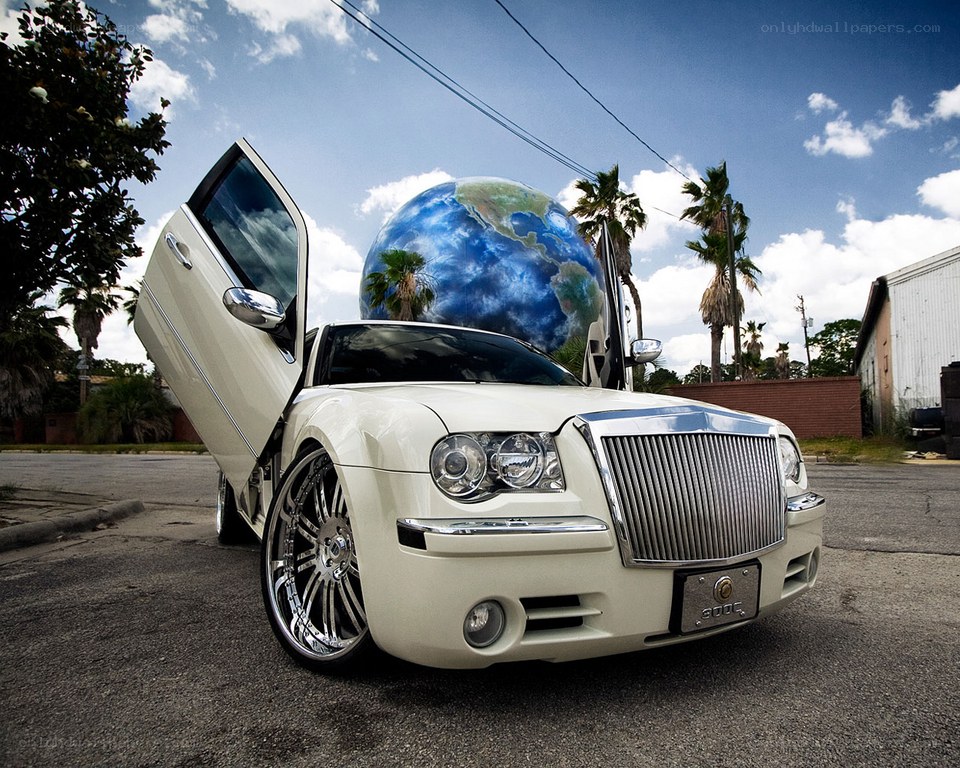 white car with globe background