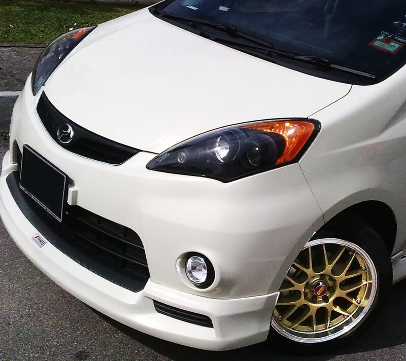 white car with gold wheels