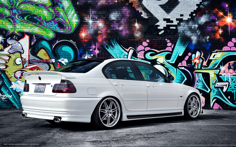 white car with graffiti background