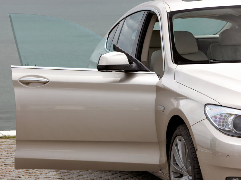 White car with open door