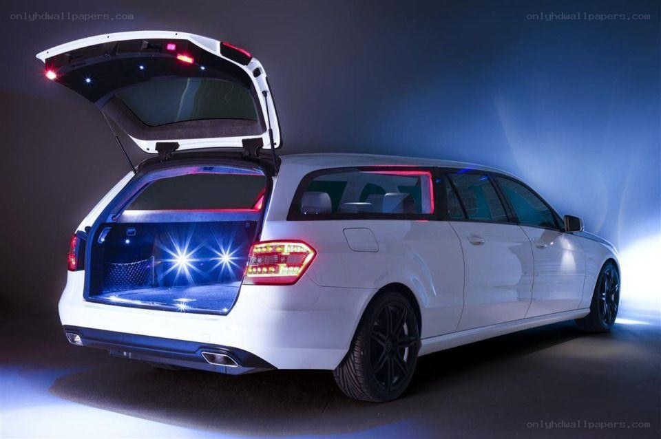 White car with open trunk