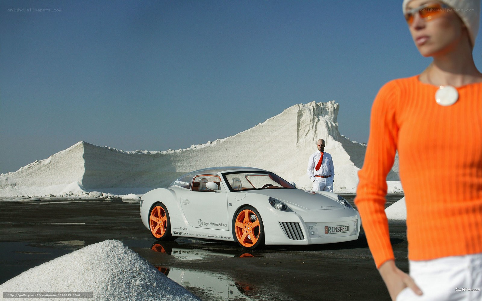 White car with orange wheels