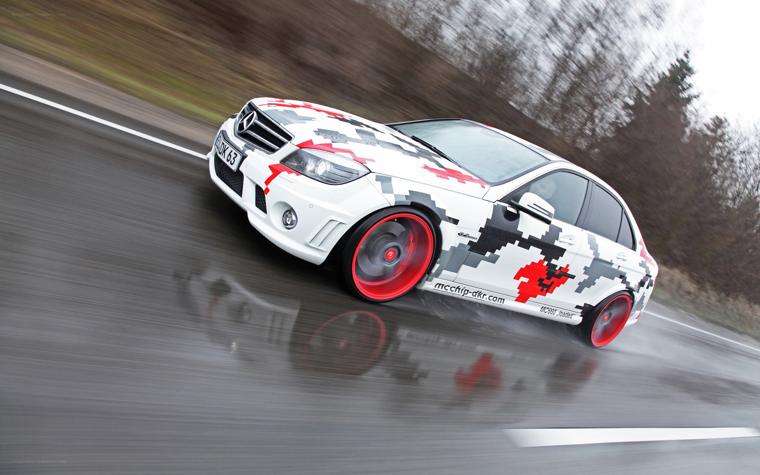 white car with red and black graphics