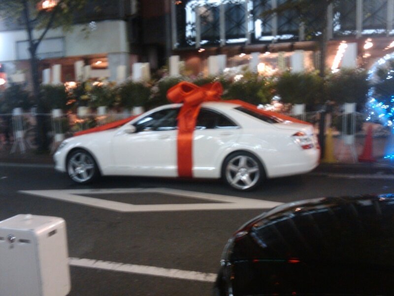 White car with red bow