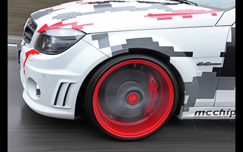 white car with red wheels