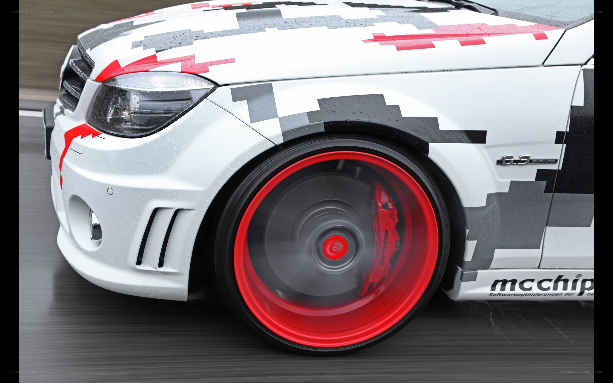white car with red wheels