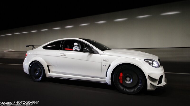 white car with stormtrooper driver