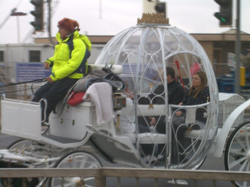 White Carriage with Passengers