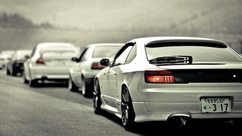 white cars in a line
