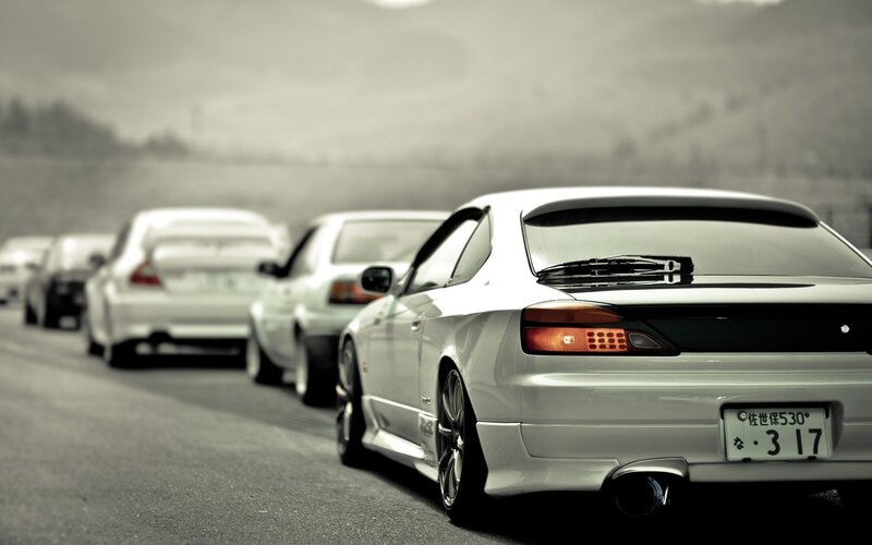 white cars in a line