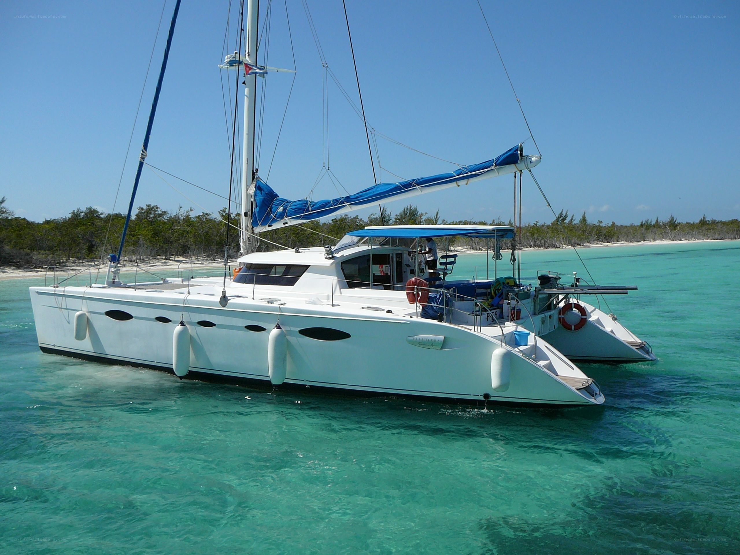White catamaran in turquoise water