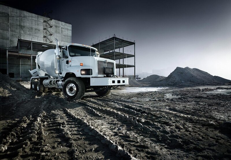 White cement mixer at construction site
