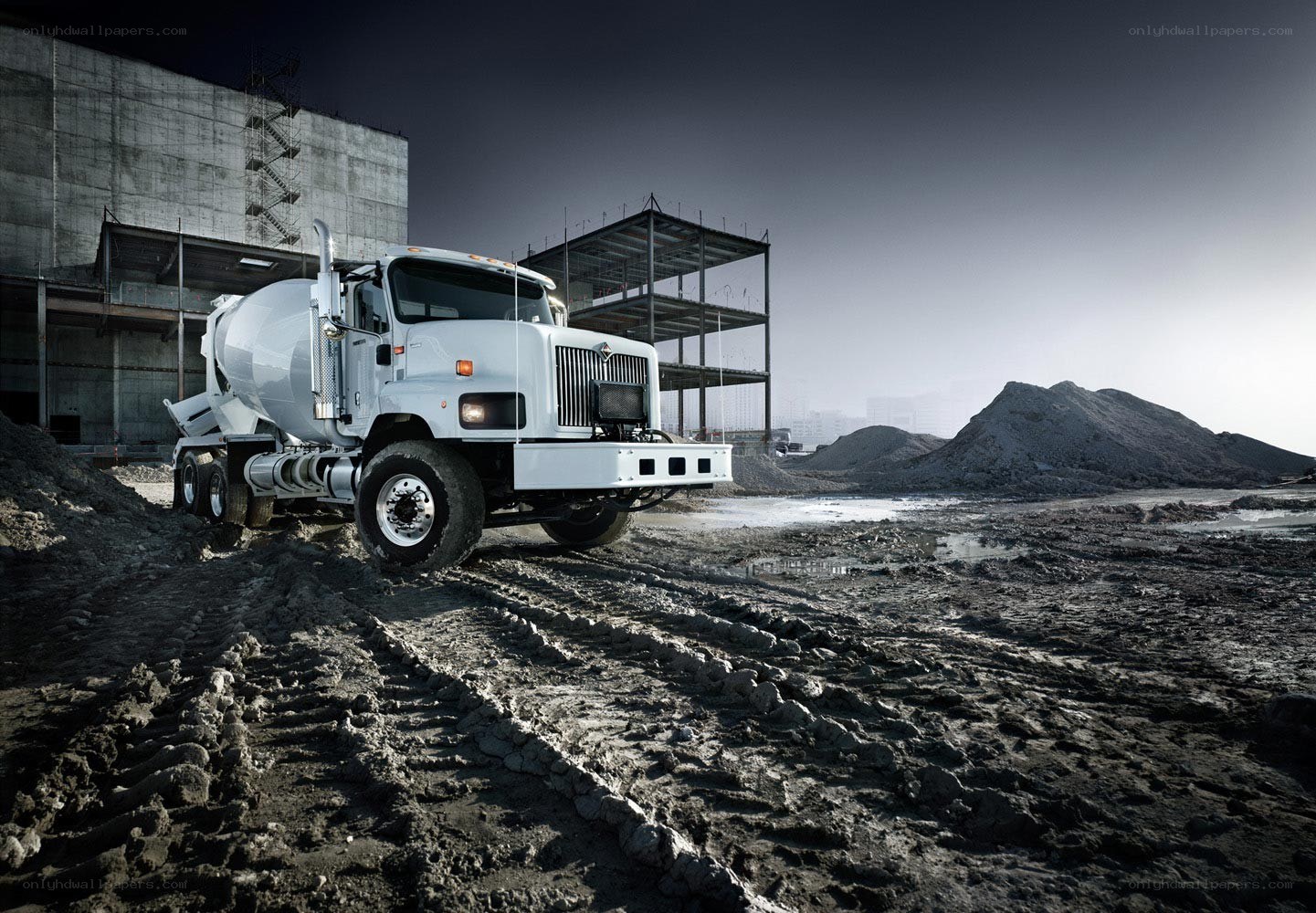 White cement mixer at construction site
