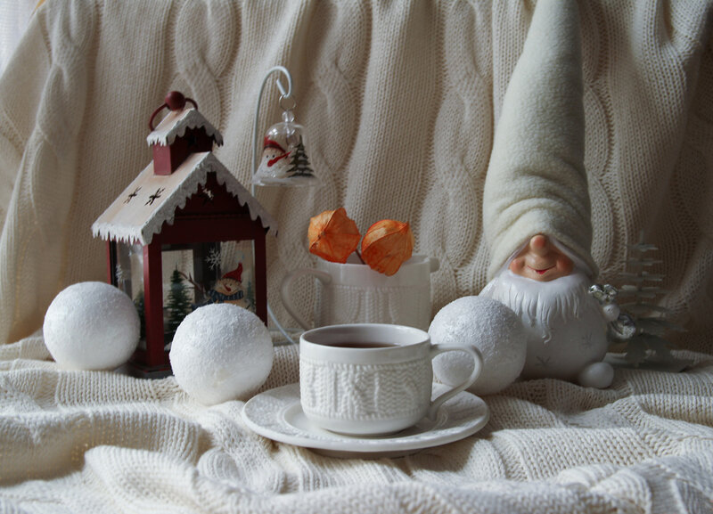 White Ceramic Cup and Gnome