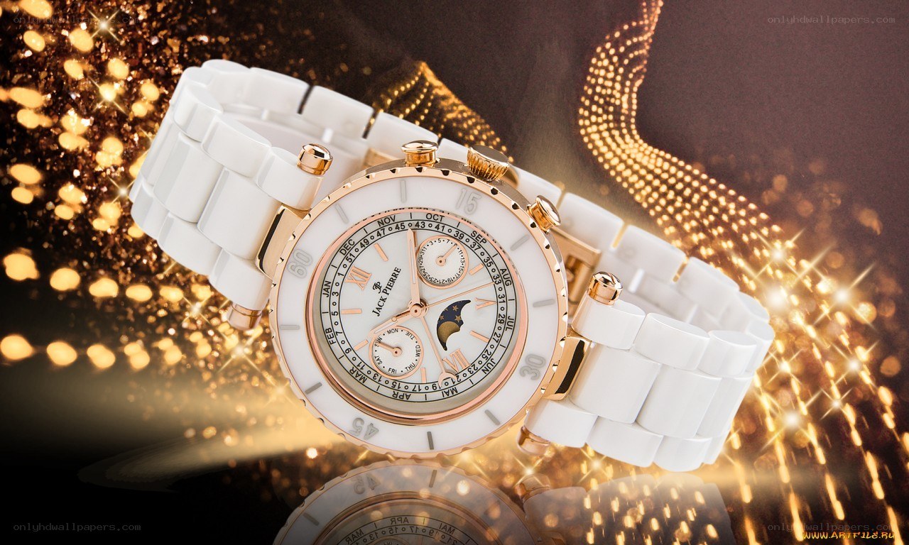 white ceramic watch with gold accents