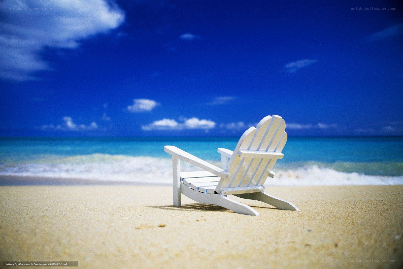 White chair on a sunny beach
