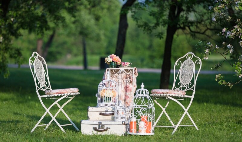 White Chairs and Birdcages