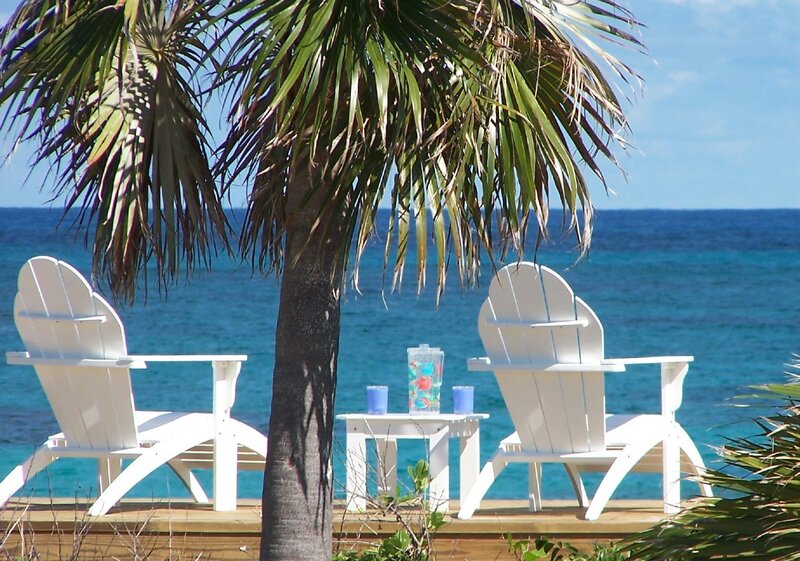 White Chairs by Ocean