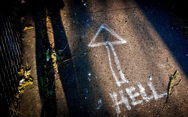 White Chalk Arrow on Pavement