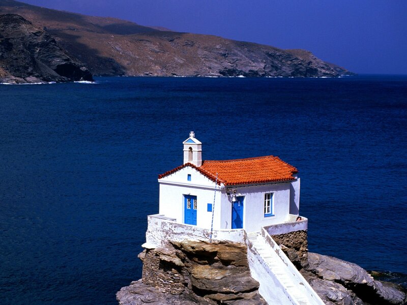 White Chapel on Cliff — Blue, Serene, Afternoon