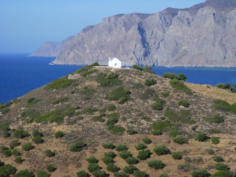 White chapel on coastal hill