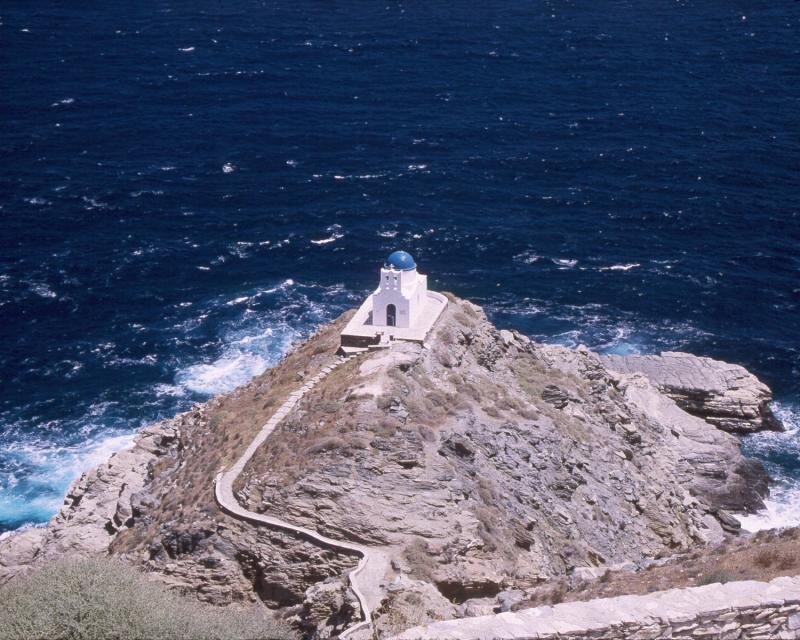 White Chapel on Rocky Cliff