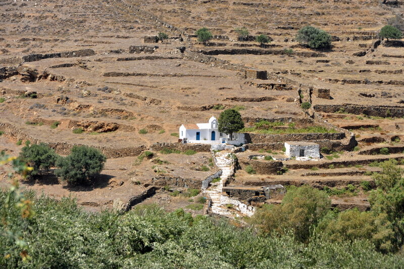 White chapel on terraced hillside