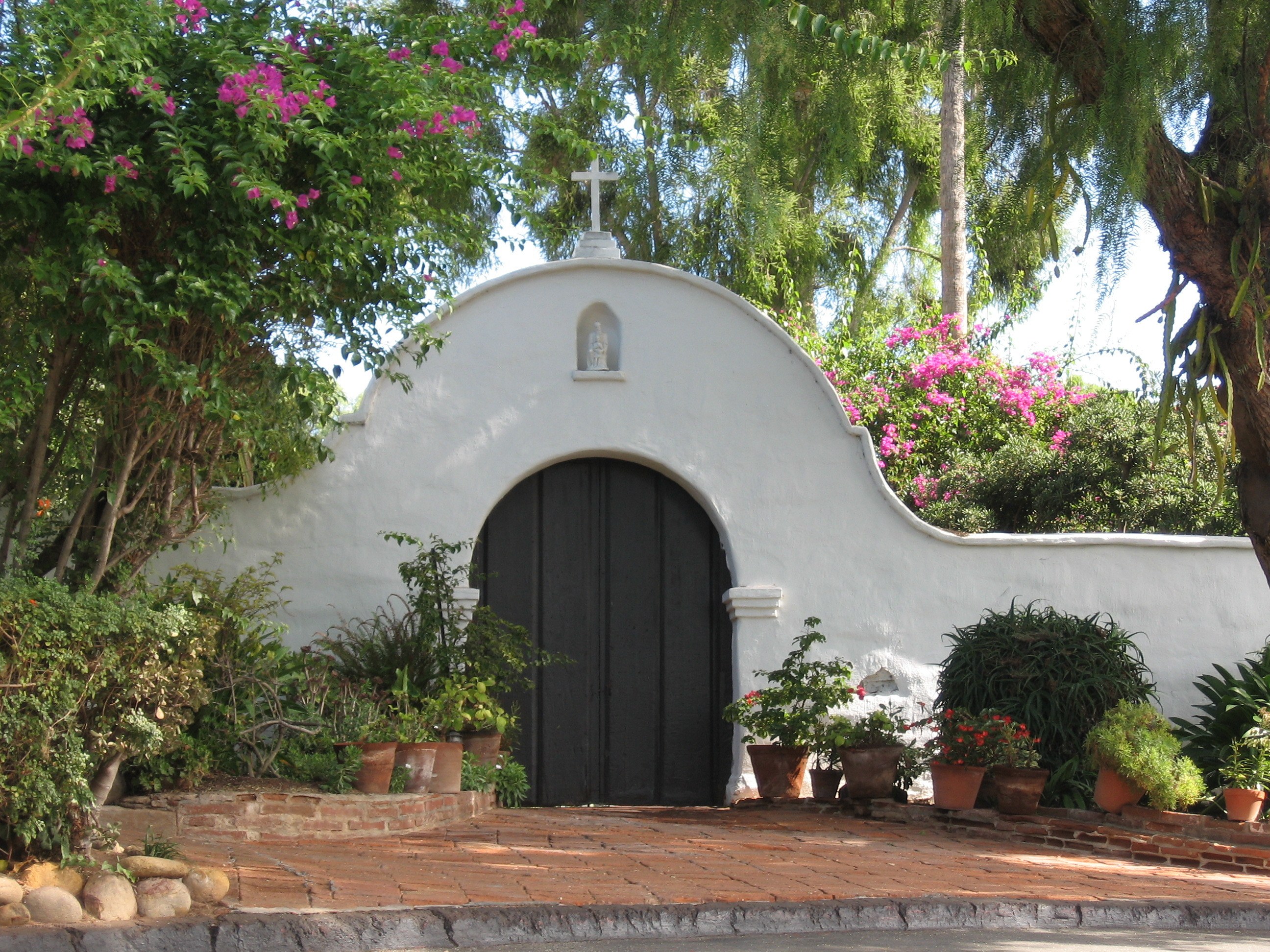 white chapel with arched door