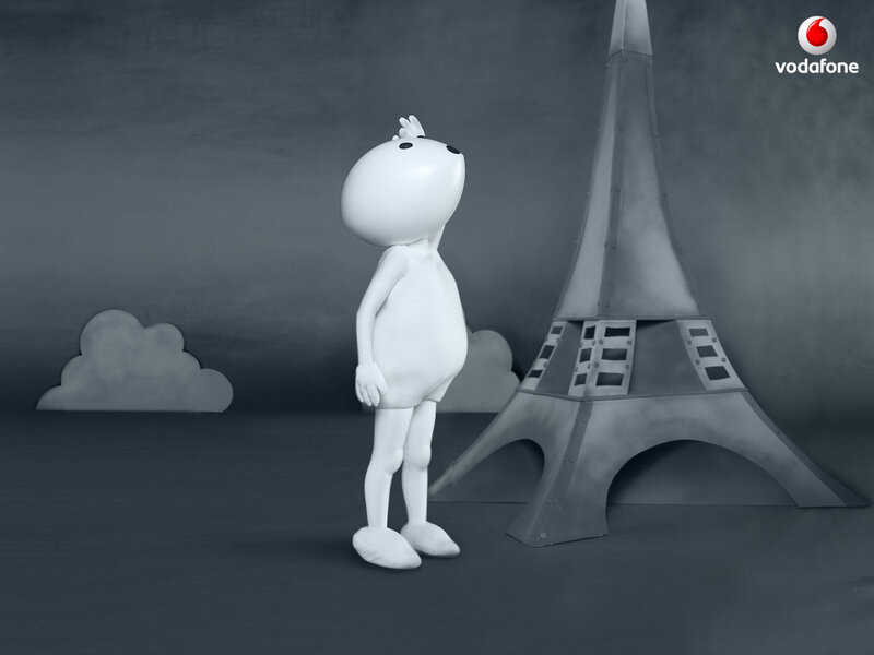 white character near eiffel tower