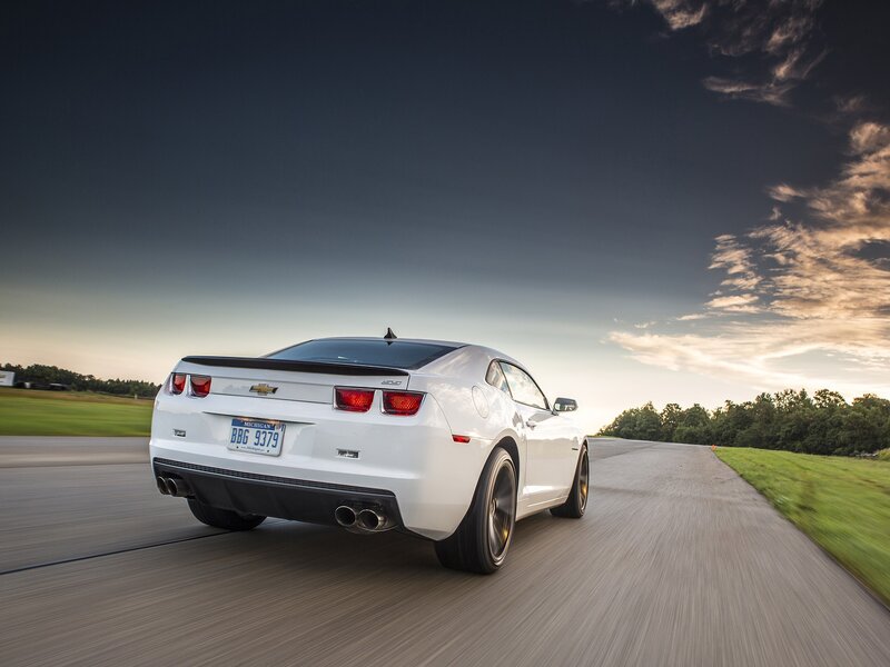 white chevrolet camaro driving