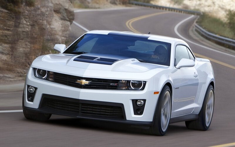 White Chevrolet Camaro on winding road