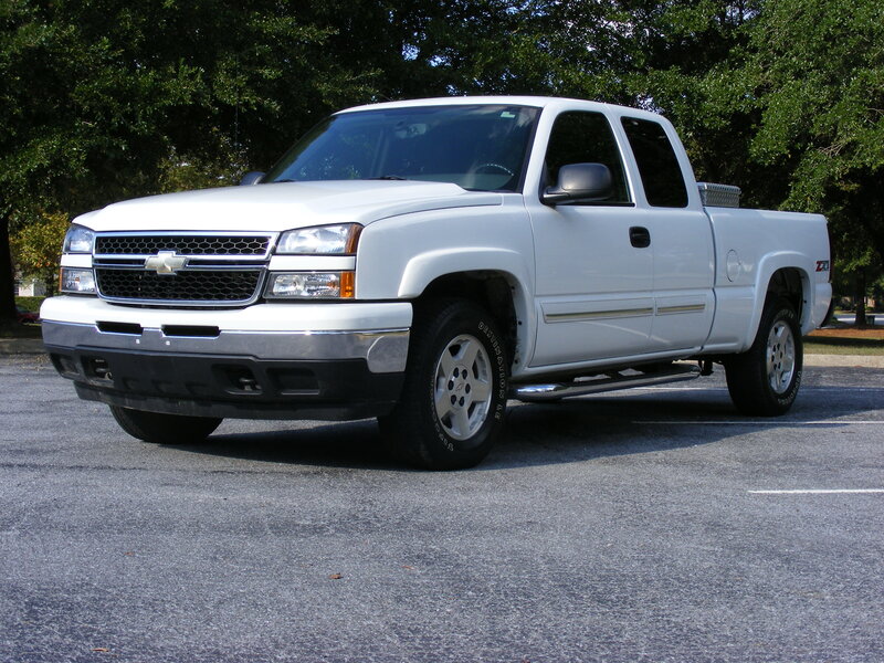 white chevrolet silverado pickup truck